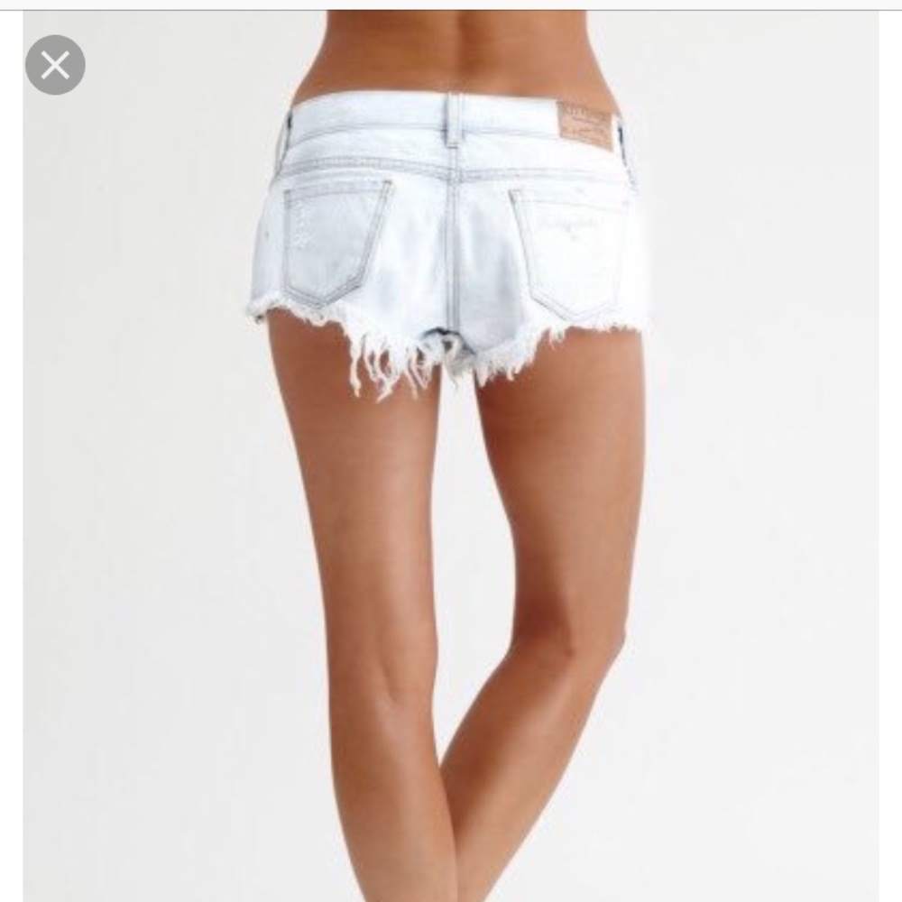Kittenish “white trash shorts”